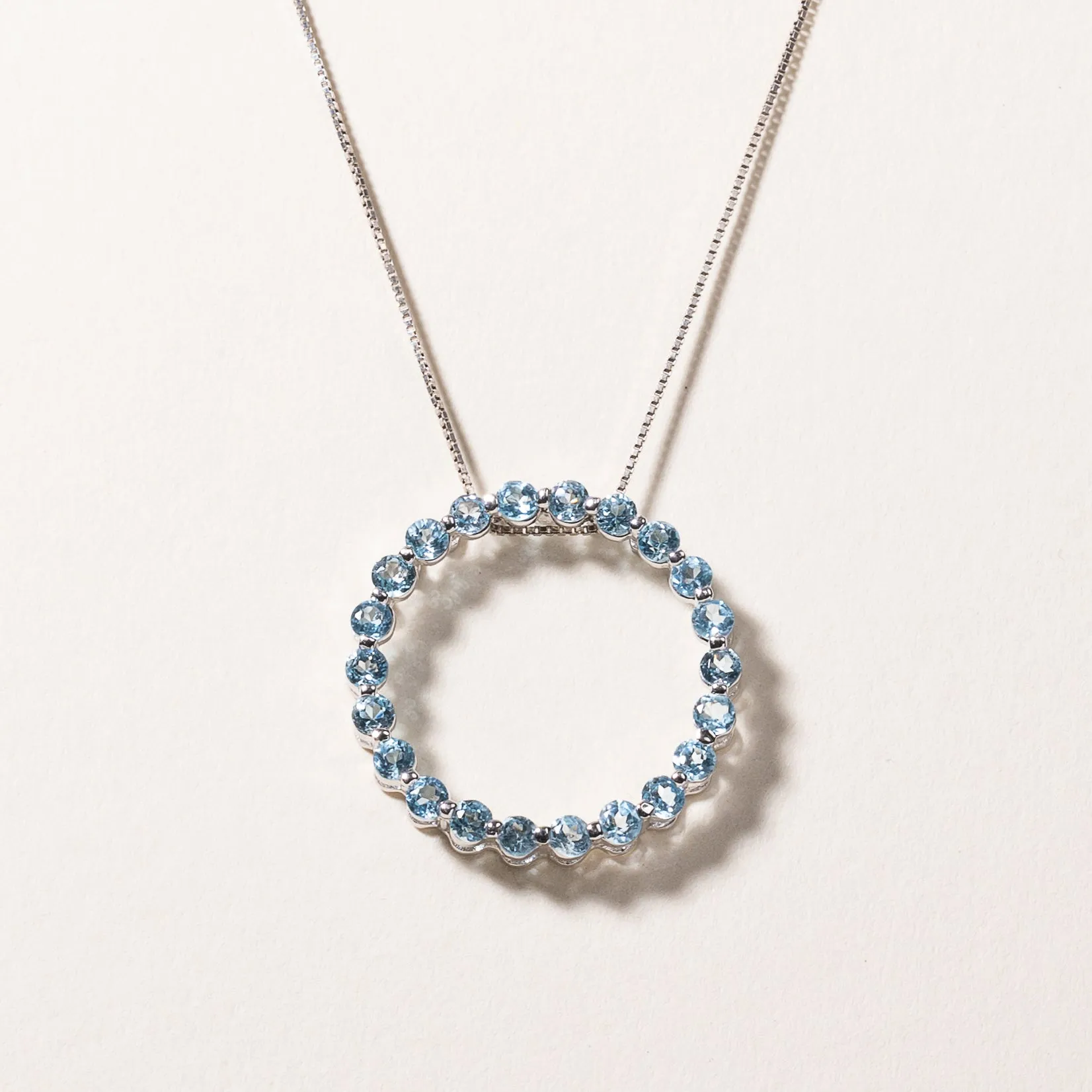 10k White Gold Circle Blue Topaz Pendant Necklace | 1.18ctw | 18"