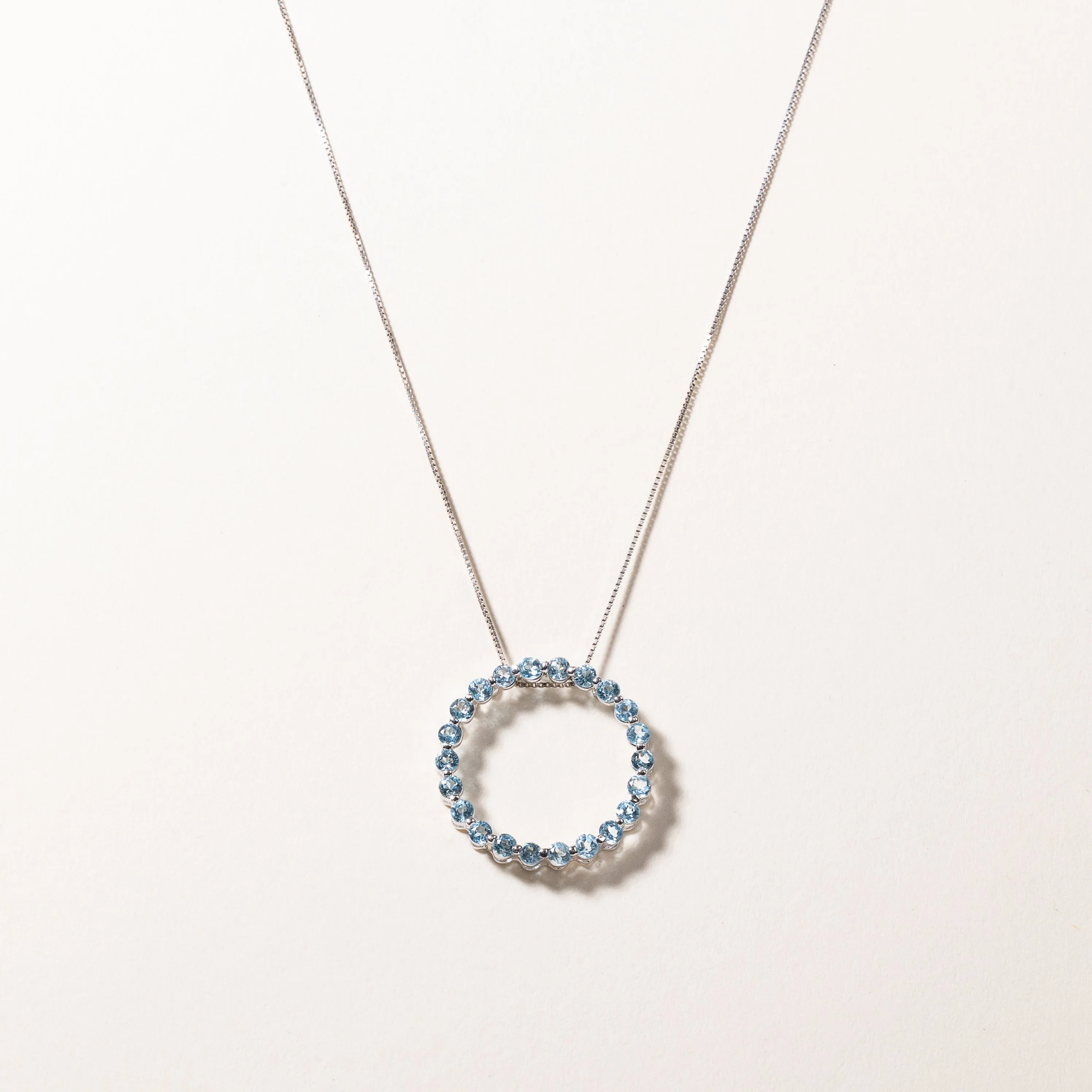10k White Gold Circle Blue Topaz Pendant Necklace | 1.18ctw | 18"